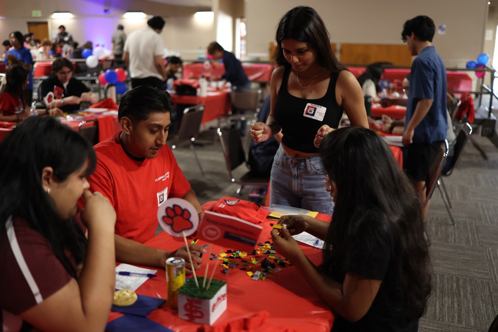 students building lego model